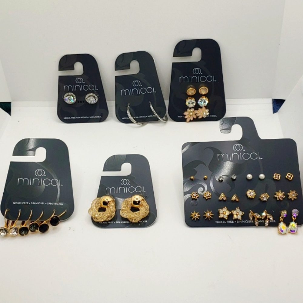 Bundled stlyes of new earrings by Minicci in Silver and Gold tone